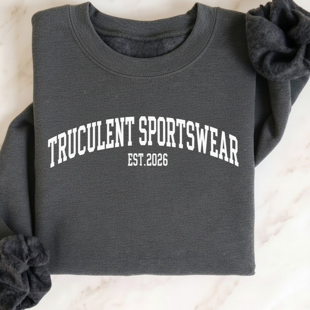 Sport gray crewneck sweatshirt laid flat on marble with arched white TRUCULENT SPORTSWEAR lettering and EST.2026 underneath